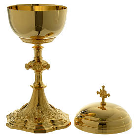 Ciborium with faces of Joseph, Mary and Jesus and leaves design in golden brass