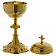 Ciborium with faces of Joseph, Mary and Jesus and leaves design in golden brass s2