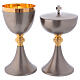 Brass chalice and ciborium with nickel-plated exterior and golden interior s1