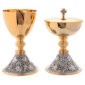 Chalice and ciborium with relief grapes and leaves base