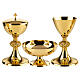 Chalice, ciborium and paten set, with leaves and grapes in brass Molina s1
