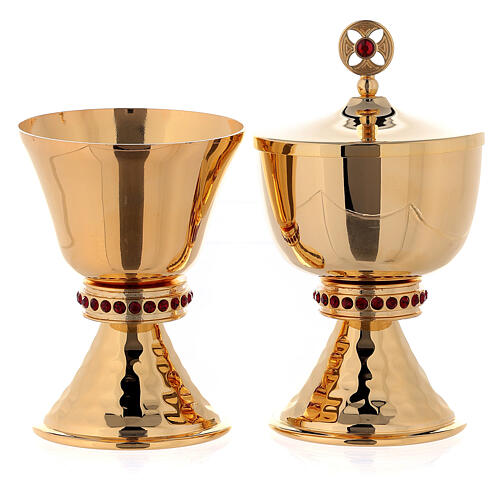 Chalice and ciborium in brass with hammered base and decorated with red stones 1