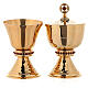 Chalice and ciborium in brass with hammered base and decorated with red stones s1