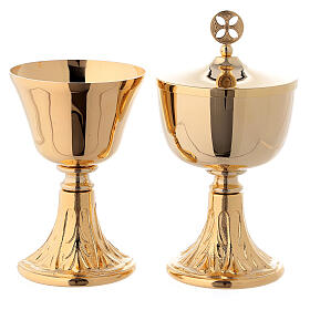 Trave chalice and ciborium in brass with leaves decoration on base