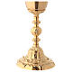 Chalice and ciborium in golden brass with baroque base s3