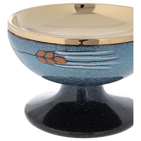 Paten blue ceramic and gold-plated brass with red wheat decoration, diam. 15 cm