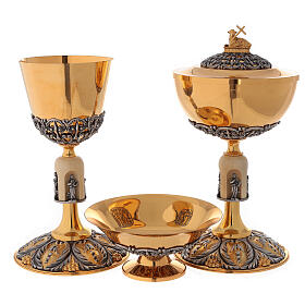 Chalice ciborium and paten Evangelists of bicolored brass