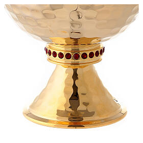 Short pyx made of brass with 24-carat gold plating and red stones
