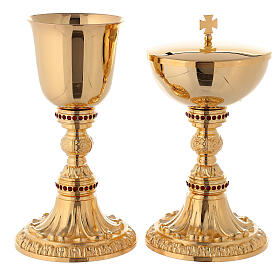Brass chalice and pyx with red stones