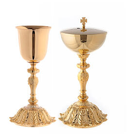 Gold plated brass chalice and ciborium with flower on the base