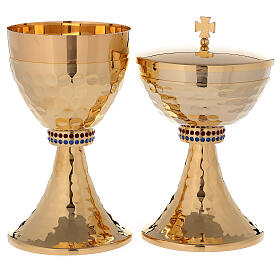 Chalice and ciborium of 24k gold plated brass with hammered base and sub-cup