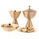 Chalice, ciborium, bowl paten and paten of gold plated brass, satin finish s1