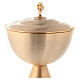 Chalice, ciborium, bowl paten and paten of gold plated brass, satin finish s6
