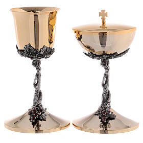 Set of chalice and ciborium, braided vine with grapes and red rhinestones