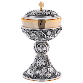 Brass decorated ciborium with bunches of grapes, leaves and vine leaves