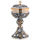 Two-colored ciborium with brass grape and vine decorations s1