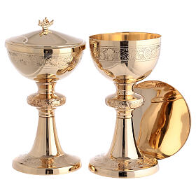 Modern chalice, ciborium and paten, gold plated brass, engraved vines