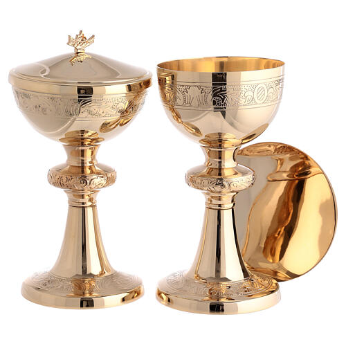 Modern chalice, ciborium and paten, gold plated brass, engraved vines 1