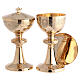 Modern chalice, ciborium and paten, gold plated brass, engraved vines s1