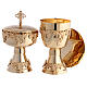 Modern set of chalice, ciborium and paten of gold plated brass, embossed vine pattern s1