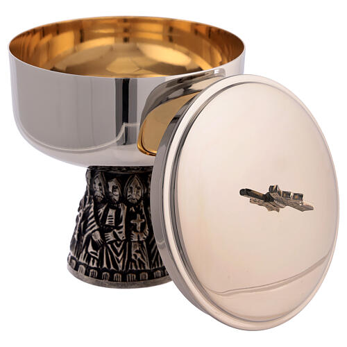 Chalice, ciborium and bowl paten of silver-plated brass, base with embossed apostles 5