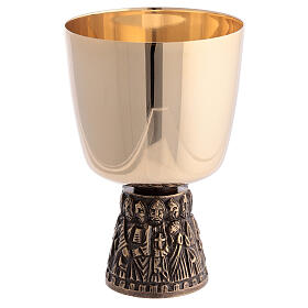 Romanesque chalice, ciborium and bowl paten of gold plated brass, base with embossed Apostles