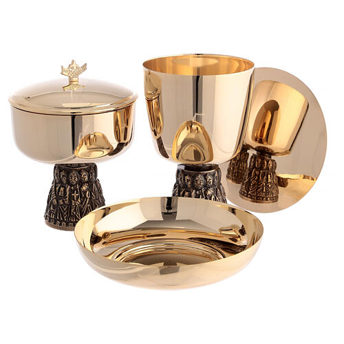 Romanesque chalice, ciborium and bowl paten of gold plated brass, base with embossed Apostles 1