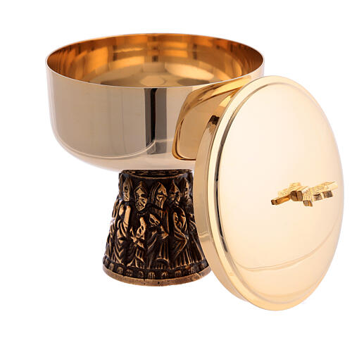 Romanesque chalice, ciborium and bowl paten of gold plated brass, base with embossed Apostles 5