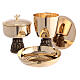Romanesque chalice, ciborium and bowl paten of gold plated brass, base with embossed Apostles s1