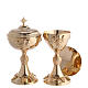 Chalice with paten and pyx in gilded brass with grape and branch decoration s1