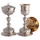 Baroque decorated chalice, ciborium and paten of silver-plated brass, floral pattern s1