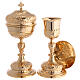 Chalice with paten and pyx in gilded brass with baroque floral decoration s1