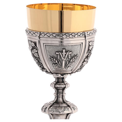 Casted chalice, bicoloured brass with embossed decorations, 13 in 6