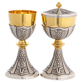 Chalice and ciborium with grape cluster embellishments in gilded brass