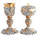 Two-tone chalice and ciborium with swirls and red stone node s1