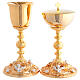 Golden chalice and ciborium with silver angels and rose patterns s1