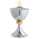 Chalice, ciborium and paten in stainless steel with Four Evangelists node s5