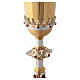 Casted altar chalice with four relief images and red stones h 30 cm, 24-kt gilding s10