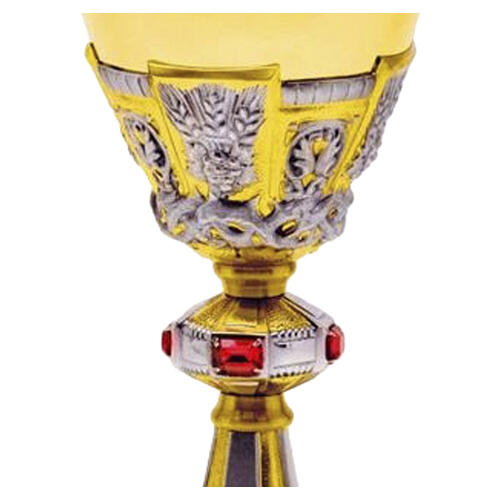 Two-tone chalice and ciborium with Gospel symbol and red stones 2
