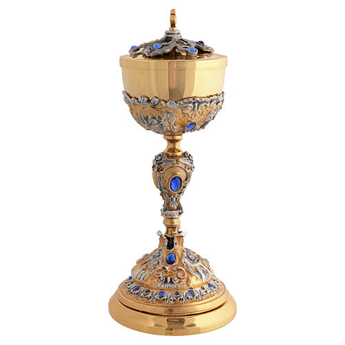Pisside in fusione doratura 24K con pietre blu chiaro e santi 14