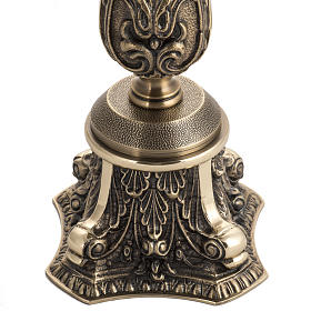 Candle holder in decorated bronze