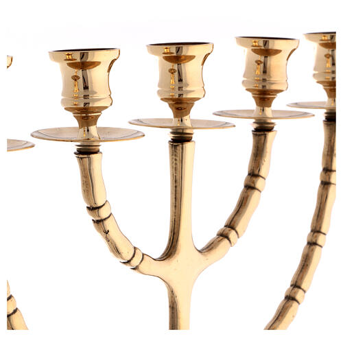 Seven flame candelabrum of polished brass, 60 in 3
