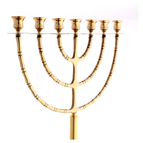 Seven flame candelabrum of polished brass, 60 in 5