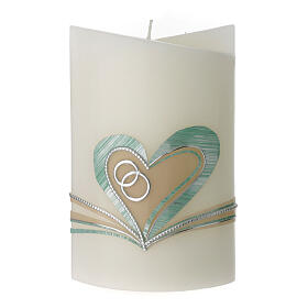 Oval candle with wedding rings and a light blue heart 18x12.5x7.5 cm