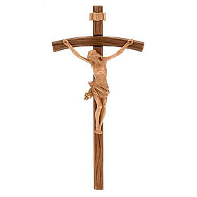 Dark wood curved cross, patinated Christ's body