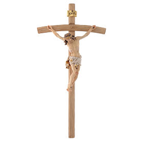 Koerper von Kristus weisse Kleidung gekruemmte Kreuz