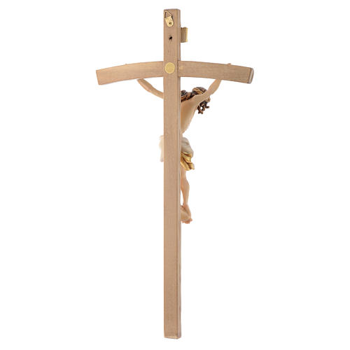 Ciało Chrystusa w białej szacie krzyż z wygiętymi 4