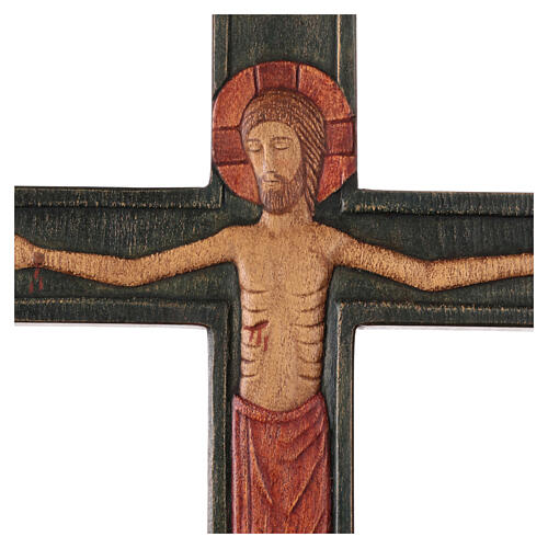 Wooden cross with Christ in relief with painted red mantle 2