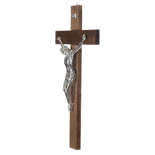 Crucifix in dark walnut wood with Christ in silver resin measuring 65cm 3