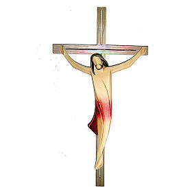 Body of Christ in ash wood with red drape